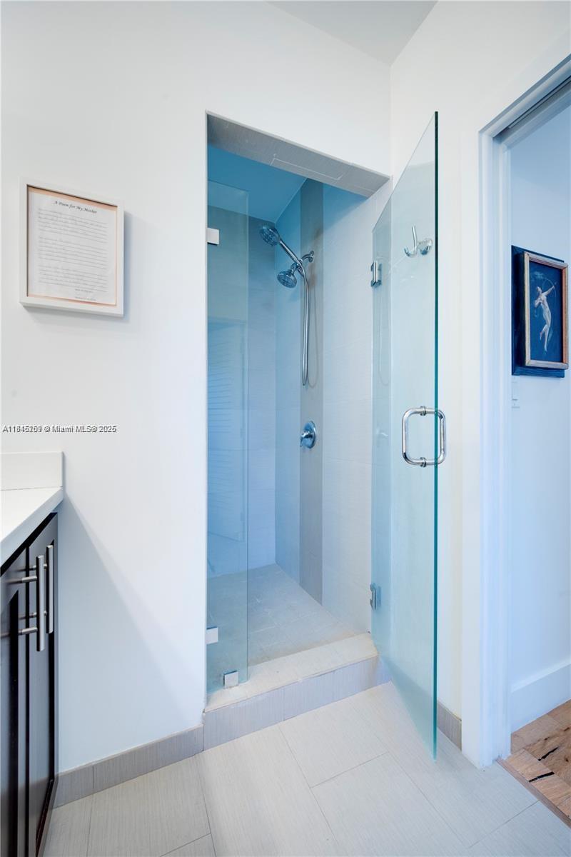 106 Florida Avenue Coral Gables, FL 33133 - Photo 20 of 34 a bathroom with a shower