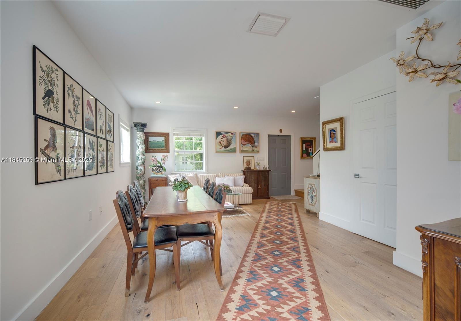 106 Florida Avenue Coral Gables, FL 33133 - Photo 8 of 34 a view of a dining room with furniture