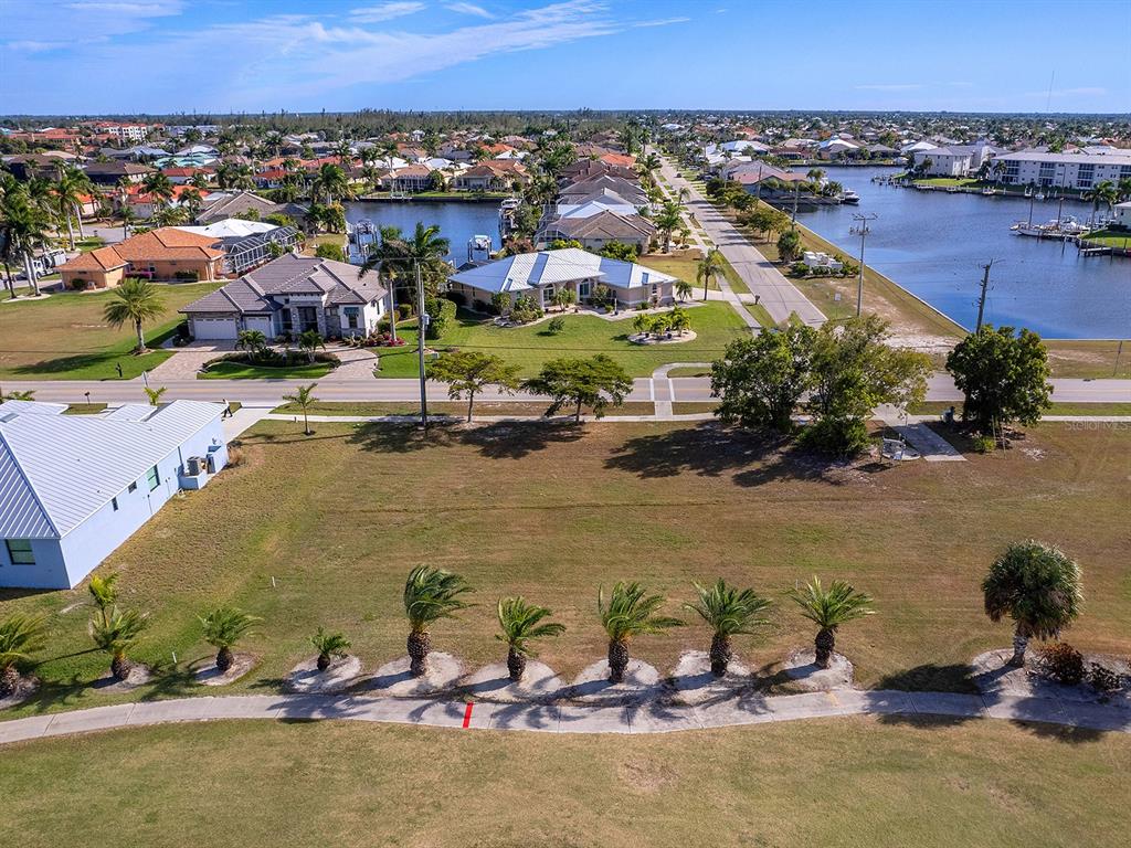 3457 Bal Harbor Boulevard Punta Gorda, FL 33950 - Photo 13 of 27 an aerial view of a house with a lake view