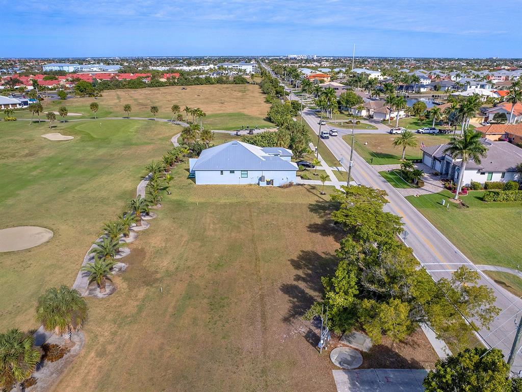 3457 Bal Harbor Boulevard Punta Gorda, FL 33950 - Photo 15 of 27 a view of a city with an ocean