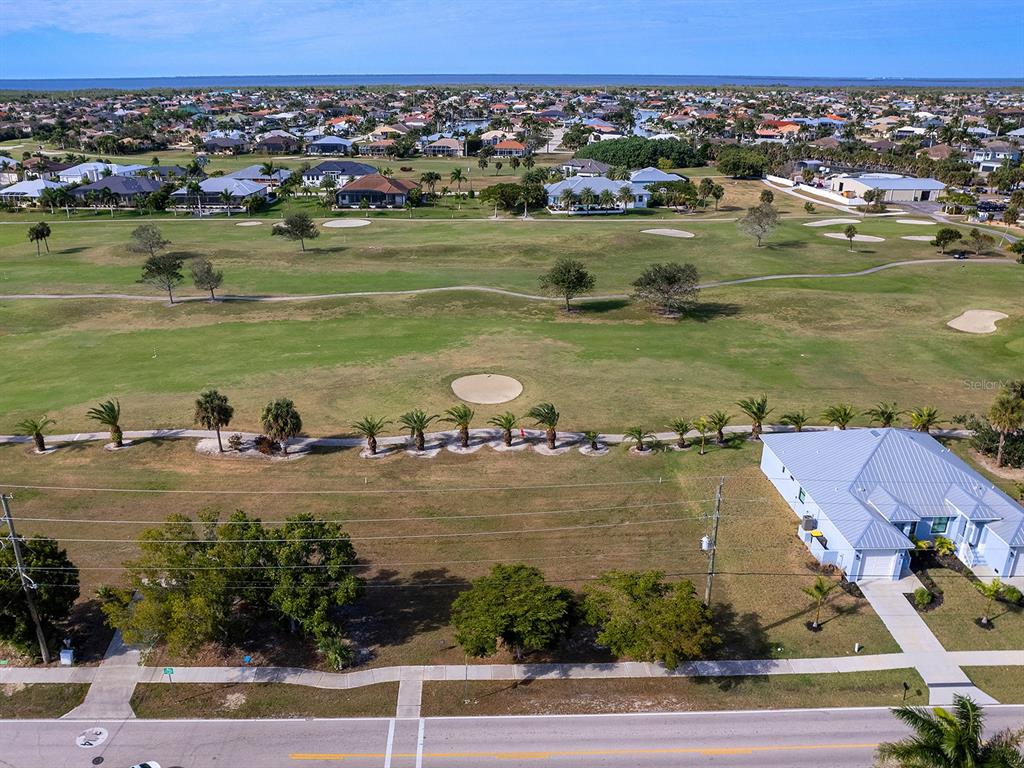 3457 Bal Harbor Boulevard Punta Gorda, FL 33950 - Photo 18 of 27 an aerial view of a houses with ocean view