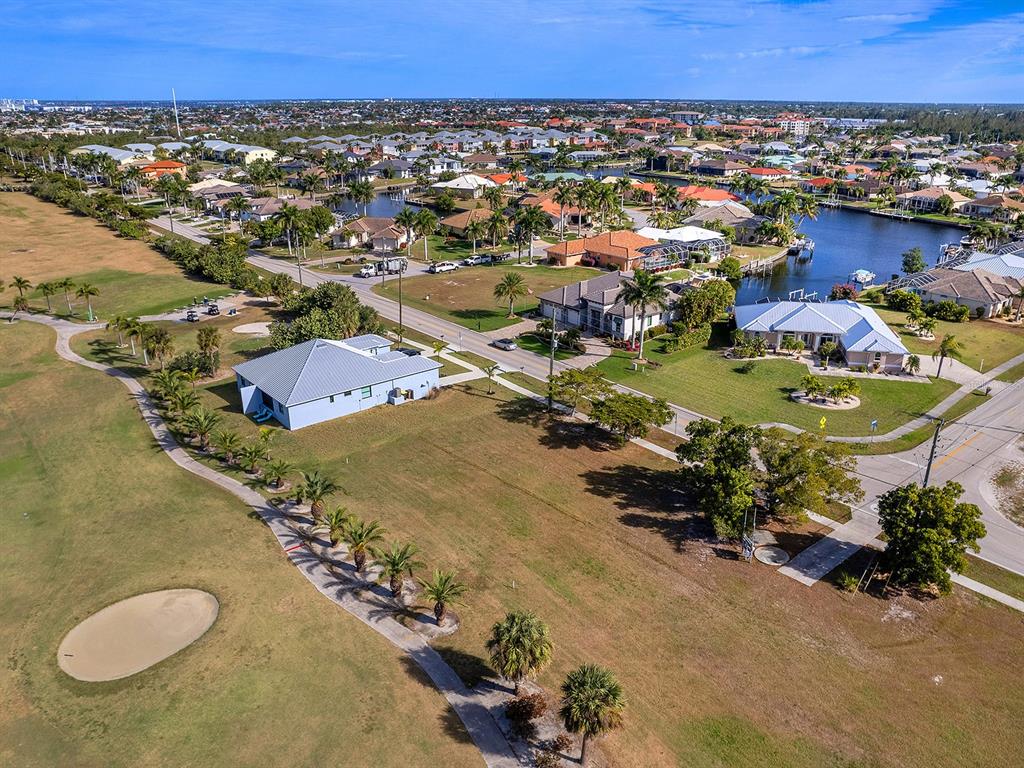3457 Bal Harbor Boulevard Punta Gorda, FL 33950 - Photo 2 of 27 an aerial view of a residential houses with outdoor space
