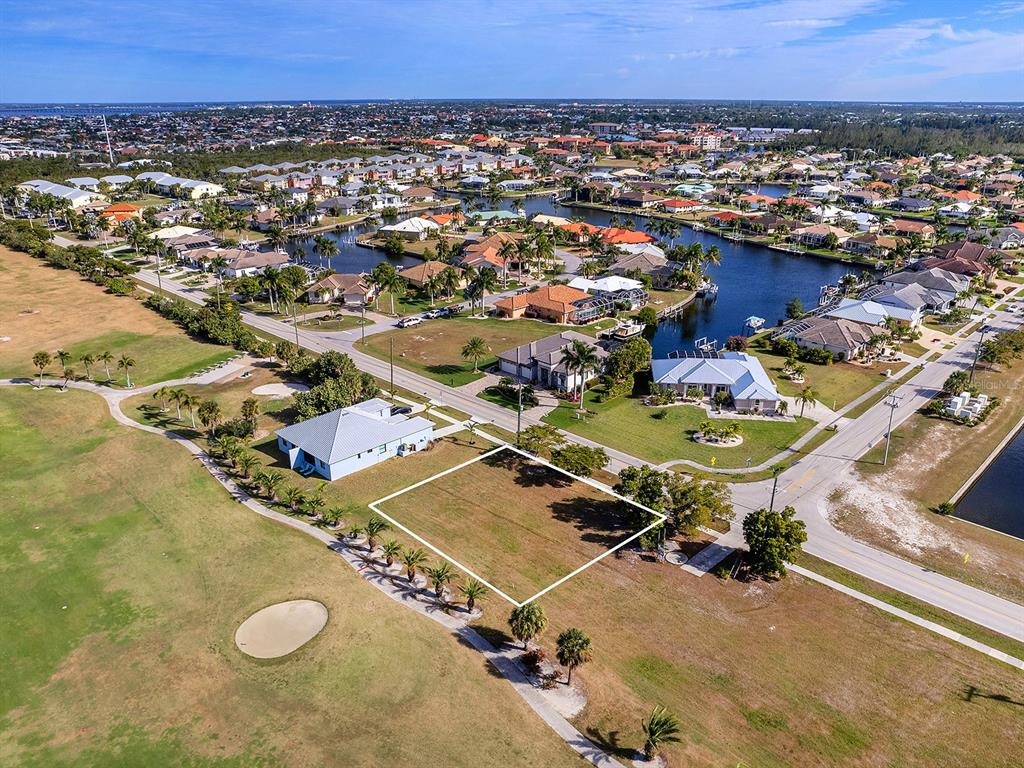 3457 Bal Harbor Boulevard Punta Gorda, FL 33950 - Photo 23 of 27 an aerial view of a house with a swimming pool