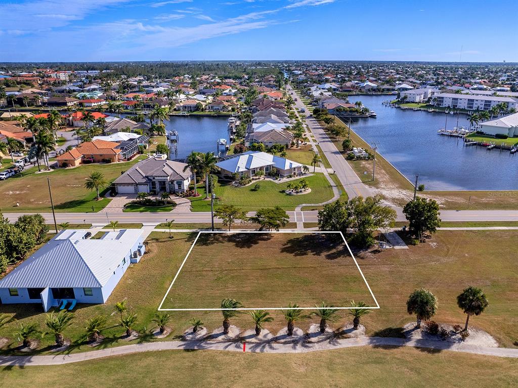 3457 Bal Harbor Boulevard Punta Gorda, FL 33950 - Photo 4 of 27 an aerial view of residential houses with outdoor space