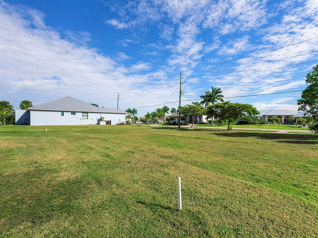 3457 Bal Harbor Boulevard Punta Gorda, FL 33950 - Photo 9 of 27 a view of a fountain with a big yard