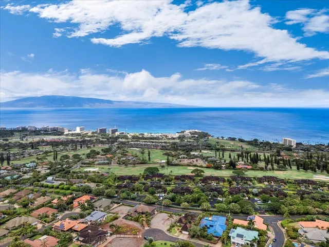 a view of a city with an ocean