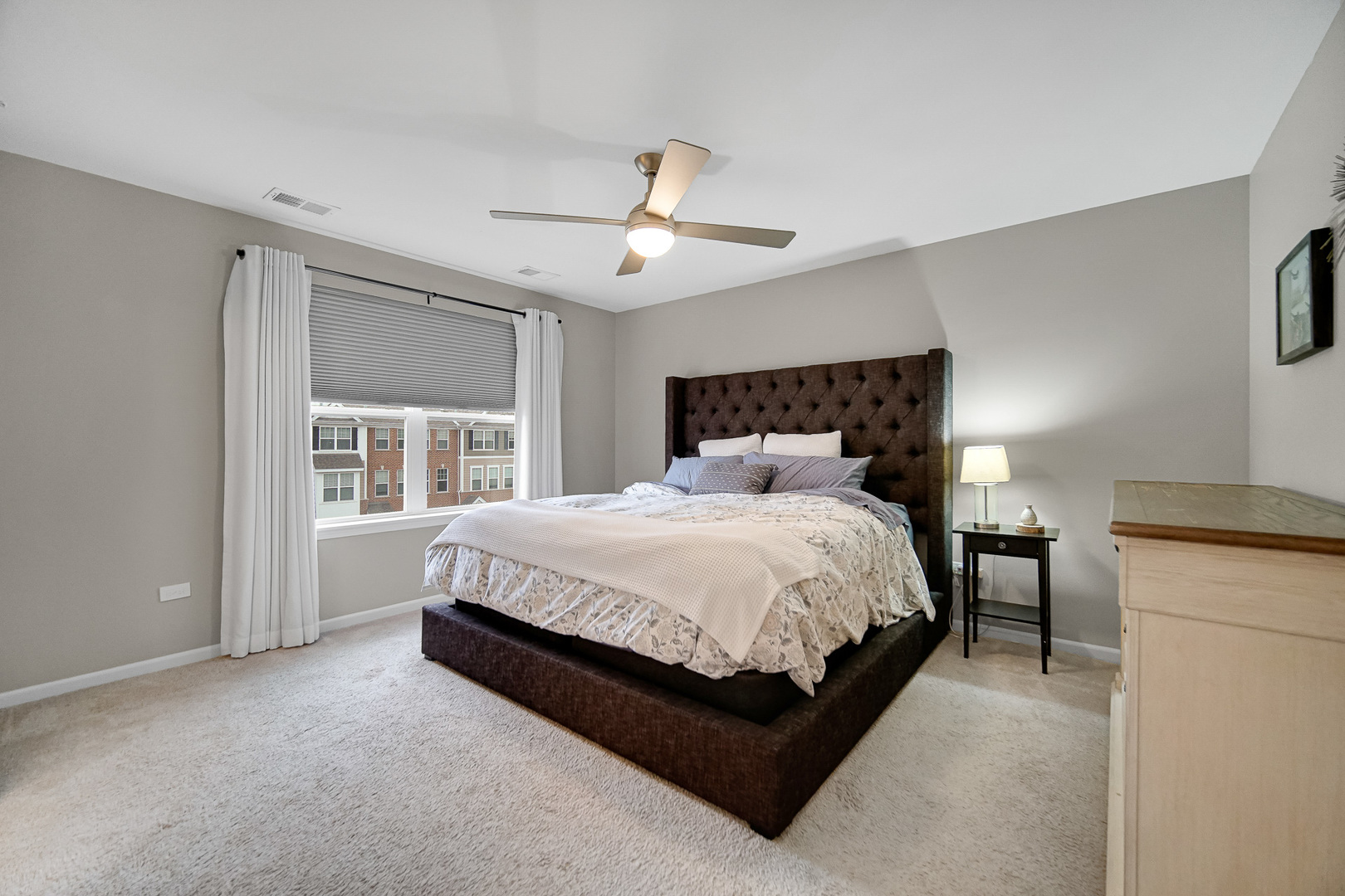 29 Grey Wolf Drive Wheeling, IL 60090 - Photo 11 of 30 a bed sitting in a bedroom and with a large window