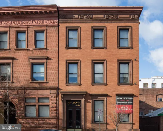 a fireplace with a clock on top