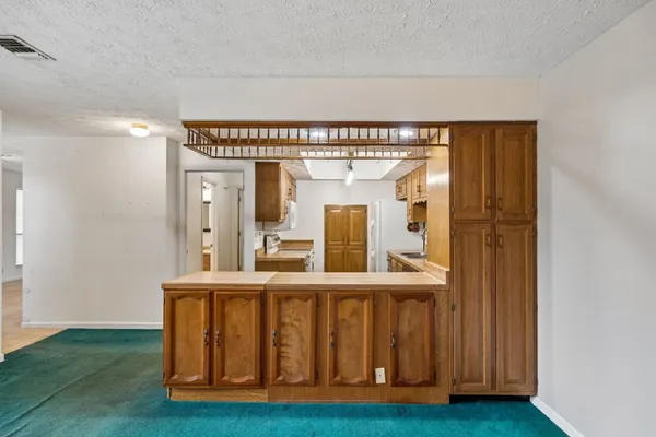 a bathroom with a sink double vanity and a mirror