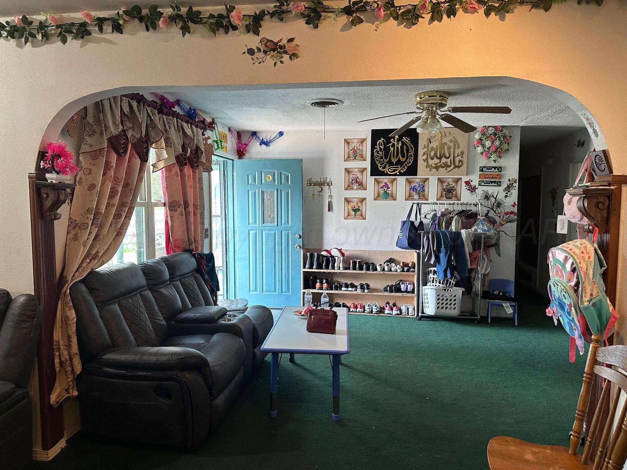 1607 Evergreen Street Amarillo, TX 79107 - Photo 2 of 18 a view of a room with gym equipment