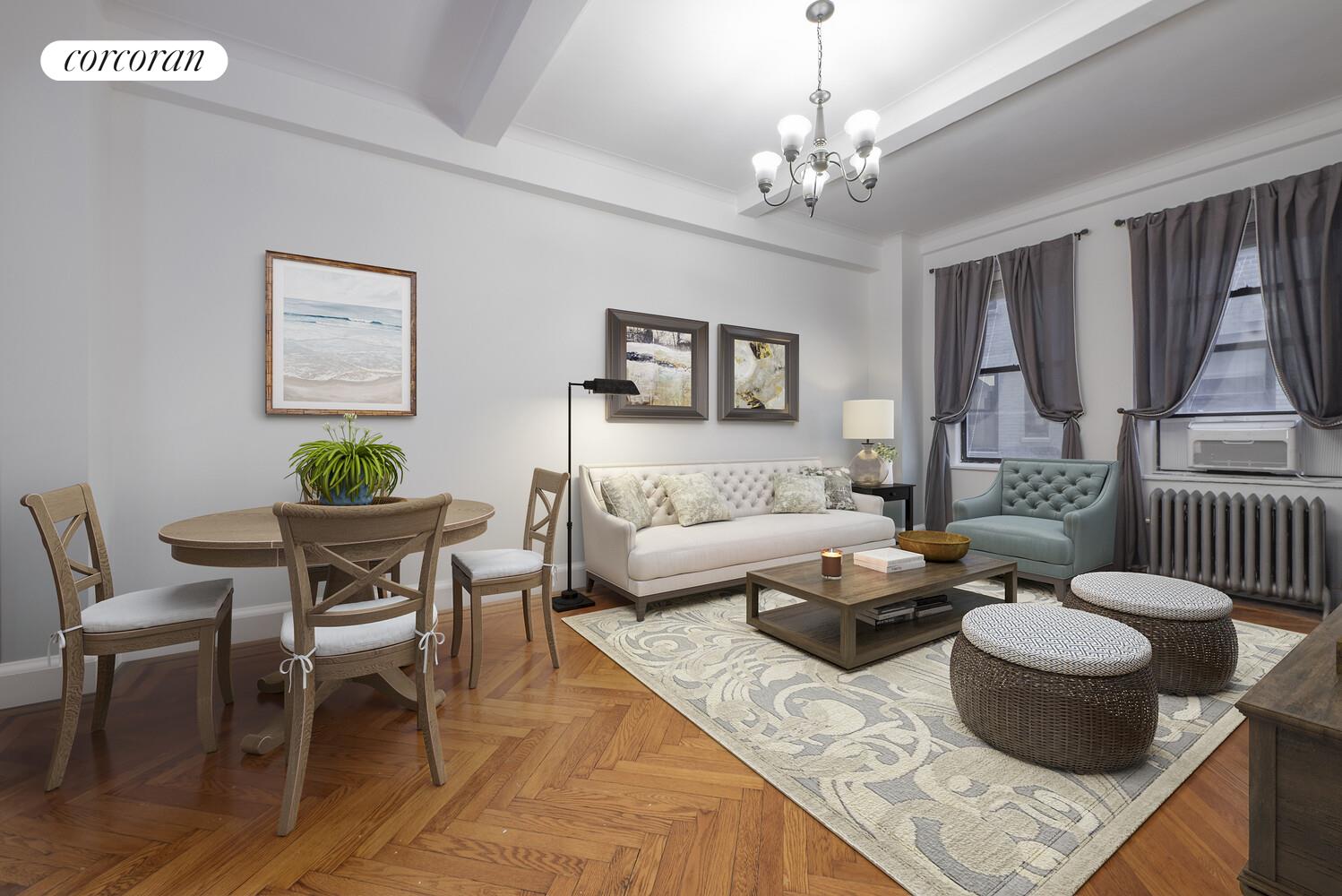 a living room with furniture and a chandelier