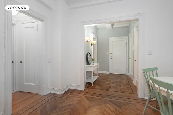 a bedroom with a bed and a table in it