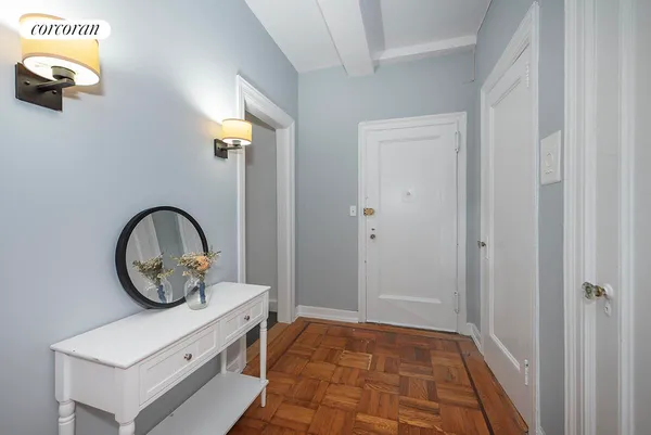 a bathroom with a bathtub sink and mirror