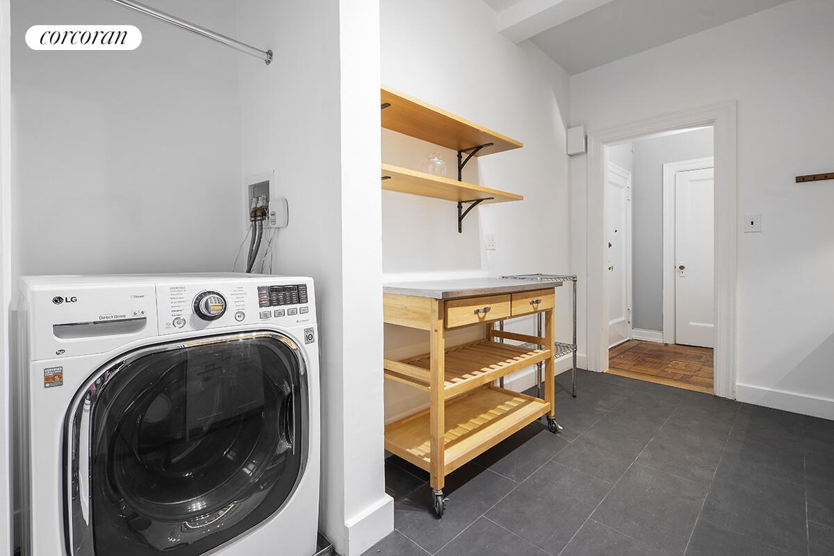 535 West 110th Street, Unit 4A Manhattan, NY 10025 - Photo 8 of 12 a utility room with dryer and washer