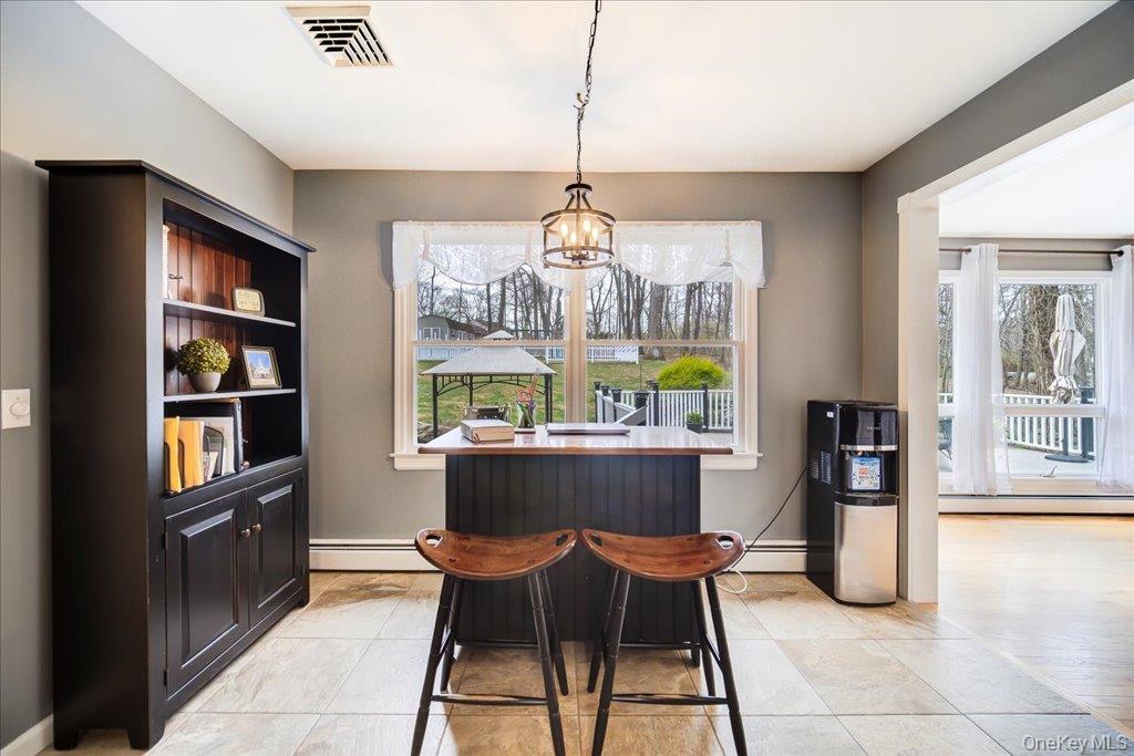 157 Brewer Road Newburgh, NY 12550 - Photo 14 of 50 This versatile space features tiled flooring, a window offering views of the outdoors, and a decorative light fixture