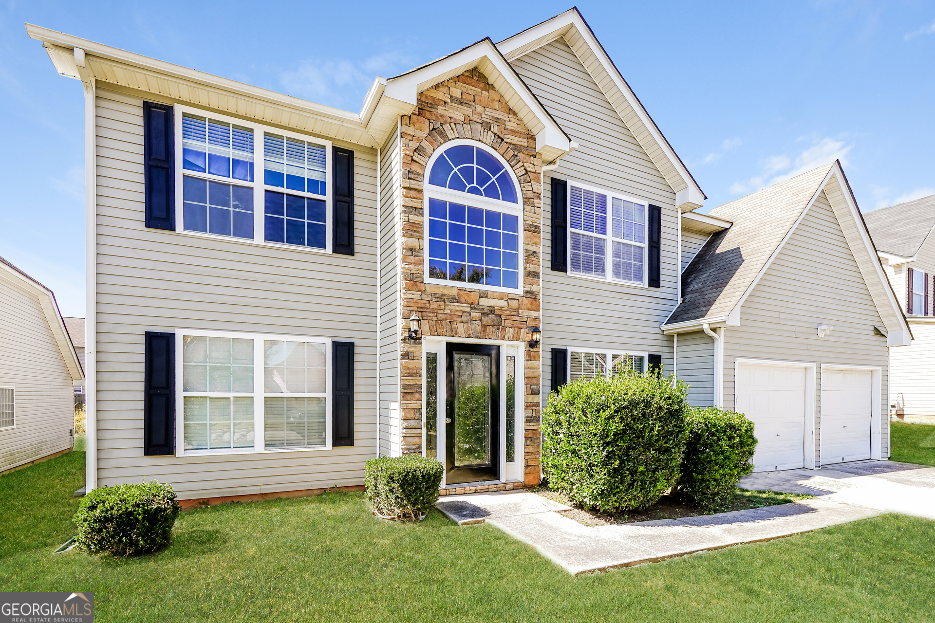 11637 Sarah Loop Hampton, GA 30228 - Photo 1 of 1 a view of front of a house with a yard