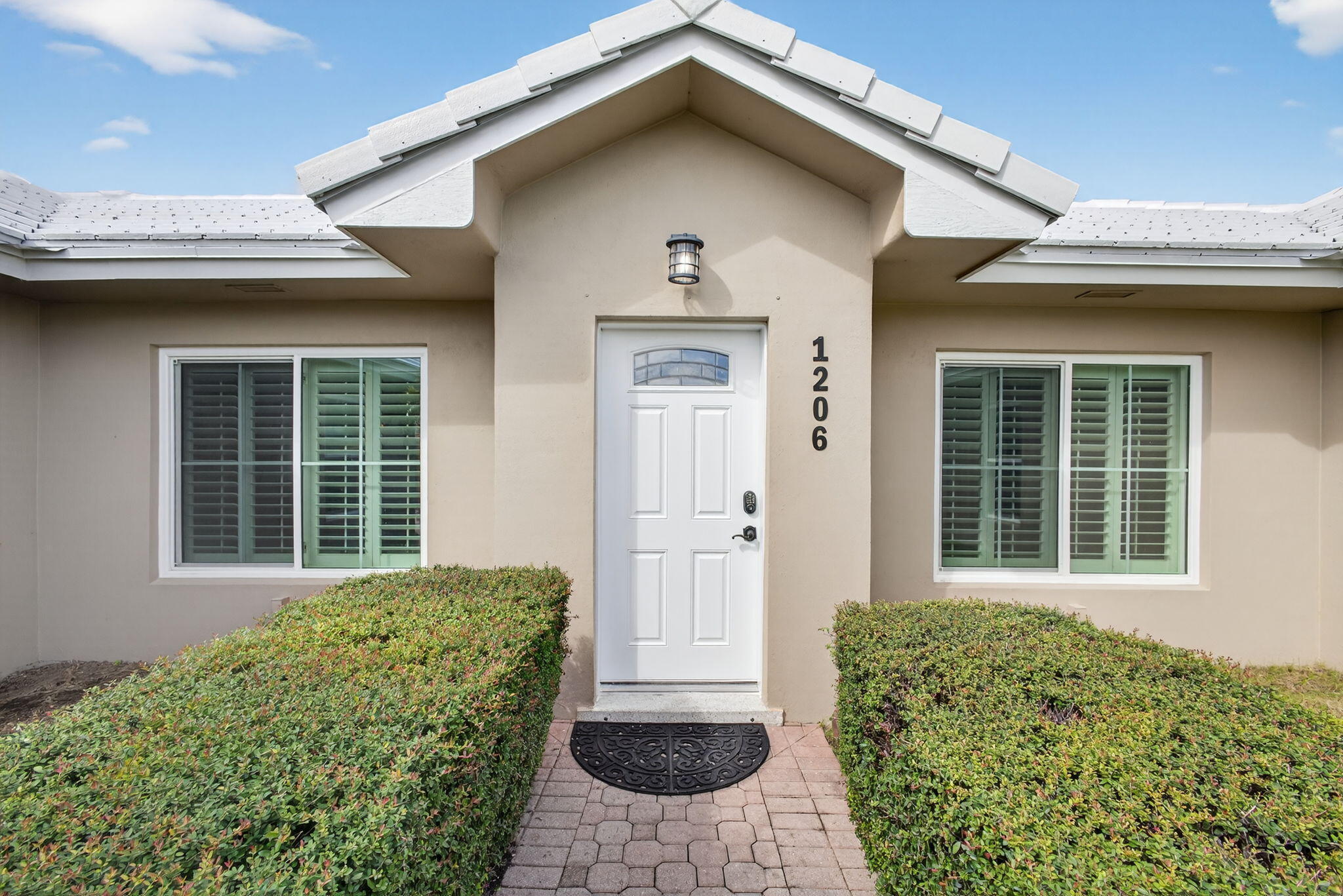 1206 Dolphin Road Singer Island, FL 33404 - Photo 7 of 65 Front Door