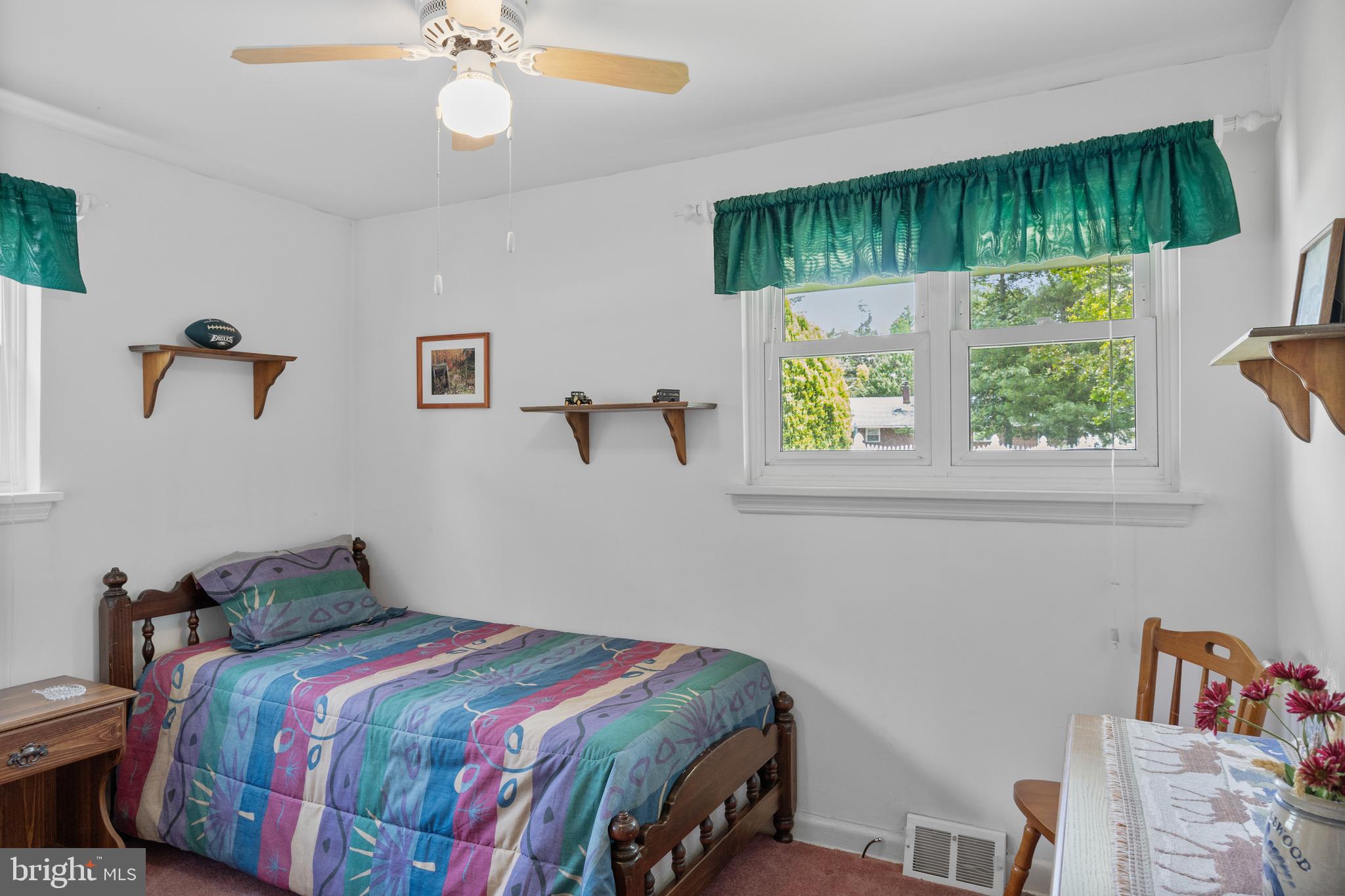 225 Buckner Avenue Haddonfield, NJ 08033 - Photo 13 of 24 a bedroom with a bed and a window