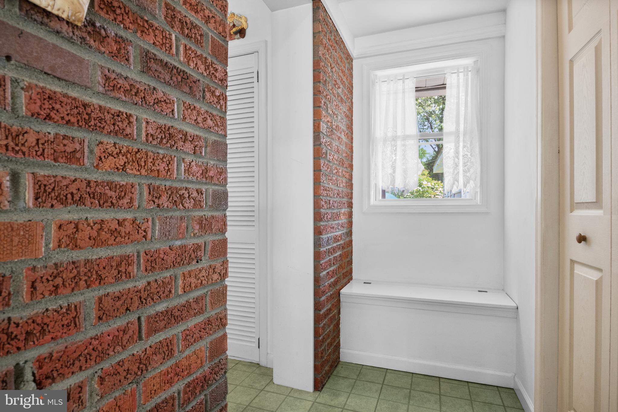 225 Buckner Avenue Haddonfield, NJ 08033 - Photo 15 of 24 a bathroom with a bathtub and window
