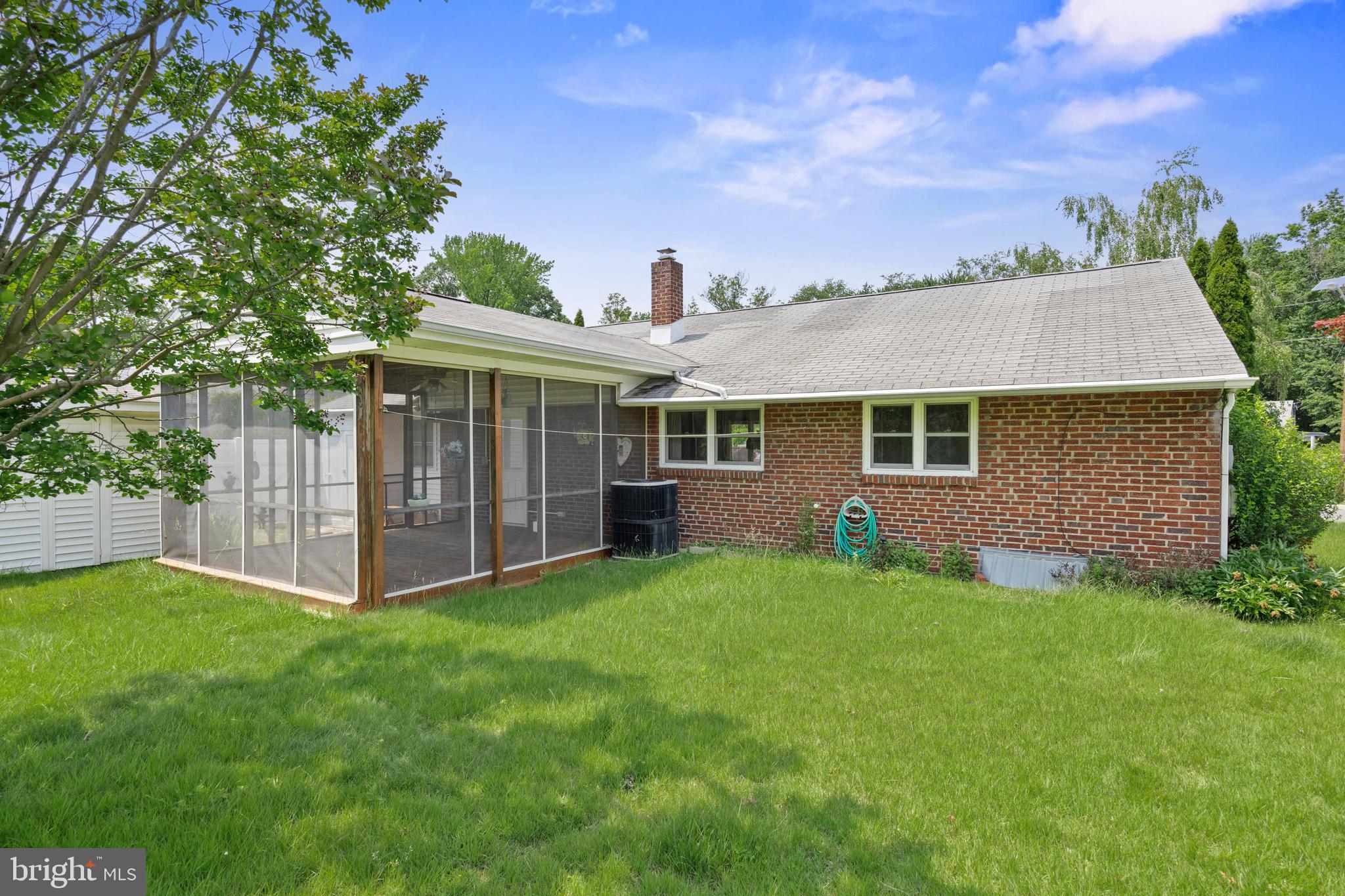 225 Buckner Avenue Haddonfield, NJ 08033 - Photo 18 of 24 a view of a house with a yard and deck