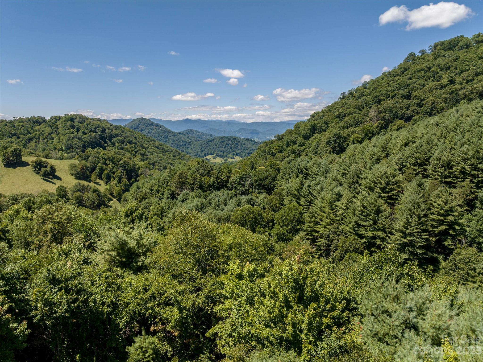 0 Runaway Ridge Clyde, NC 28721 - Photo 7 of 26 a view of a city and mountains