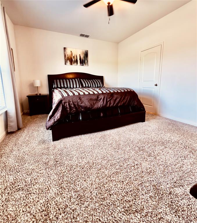 196 Cattlemans Crk Road West Newark, TX 76071 - Photo 6 of 24 Room featuring neutral tone carpeting and light-colored walls