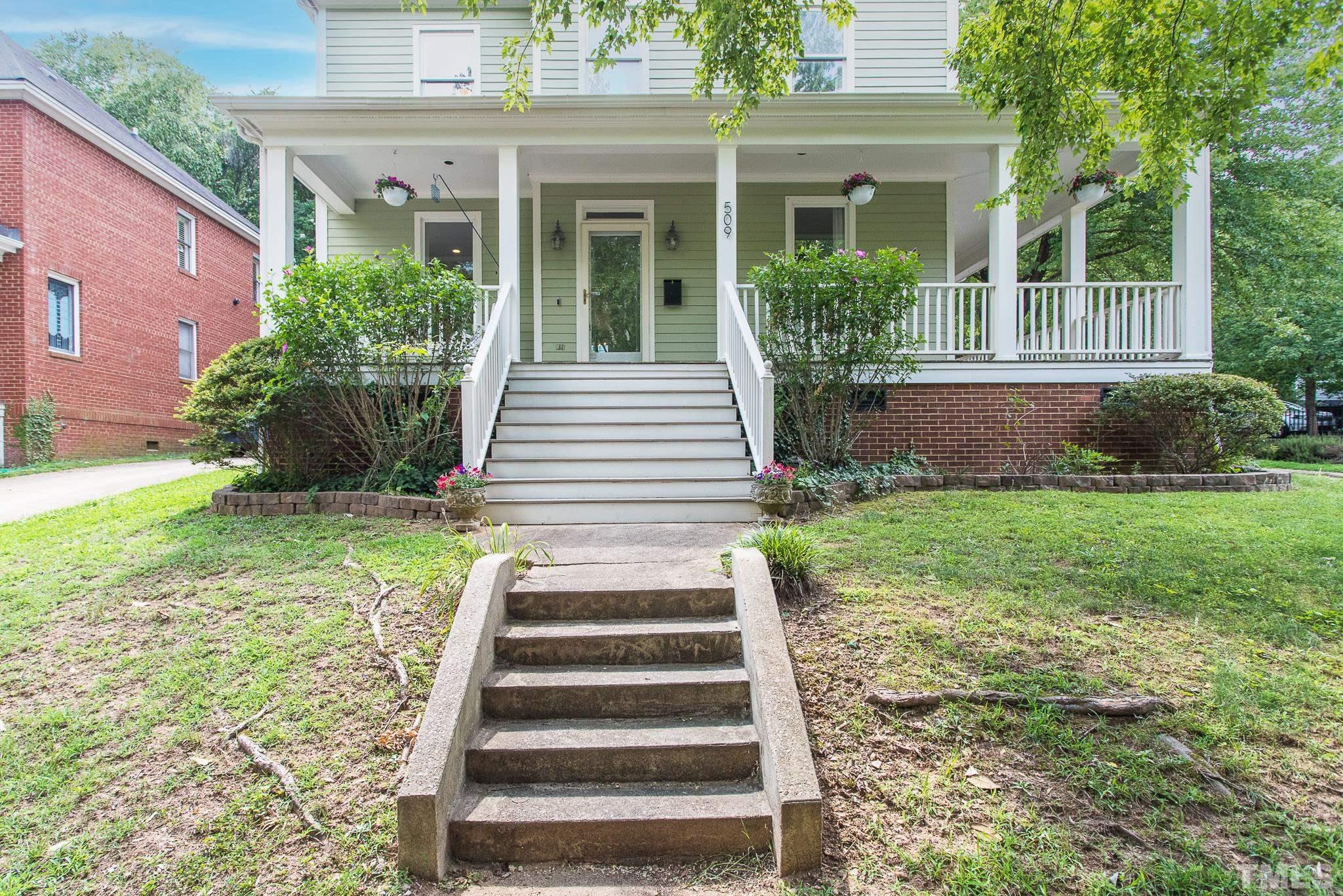 509 Watauga Street Raleigh, NC 27604 - Photo 3 of 26 front view of a house with a yard