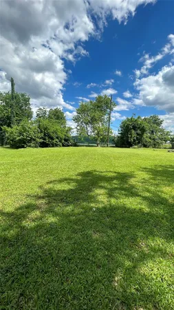 a view of outdoor space and yard