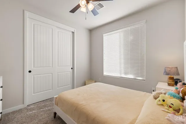 a view of a house with a yard and garage