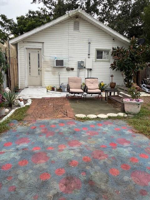 33 West F Street Frostproof, FL 33843 - Photo 2 of 10 a view of a white house with a yard