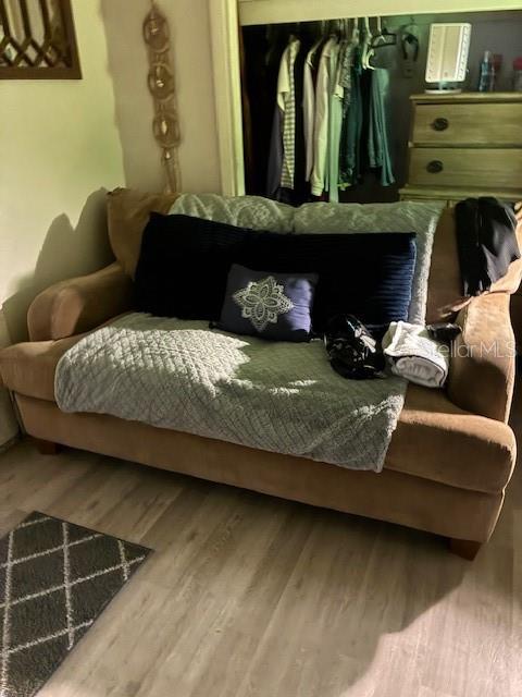 33 West F Street Frostproof, FL 33843 - Photo 5 of 10 a living room with furniture and a fireplace