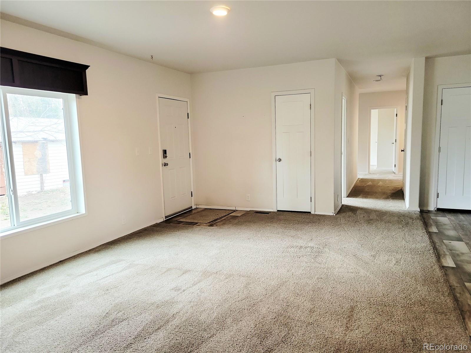 9071 South Frink Road Larkspur, CO 80118 - Photo 4 of 28