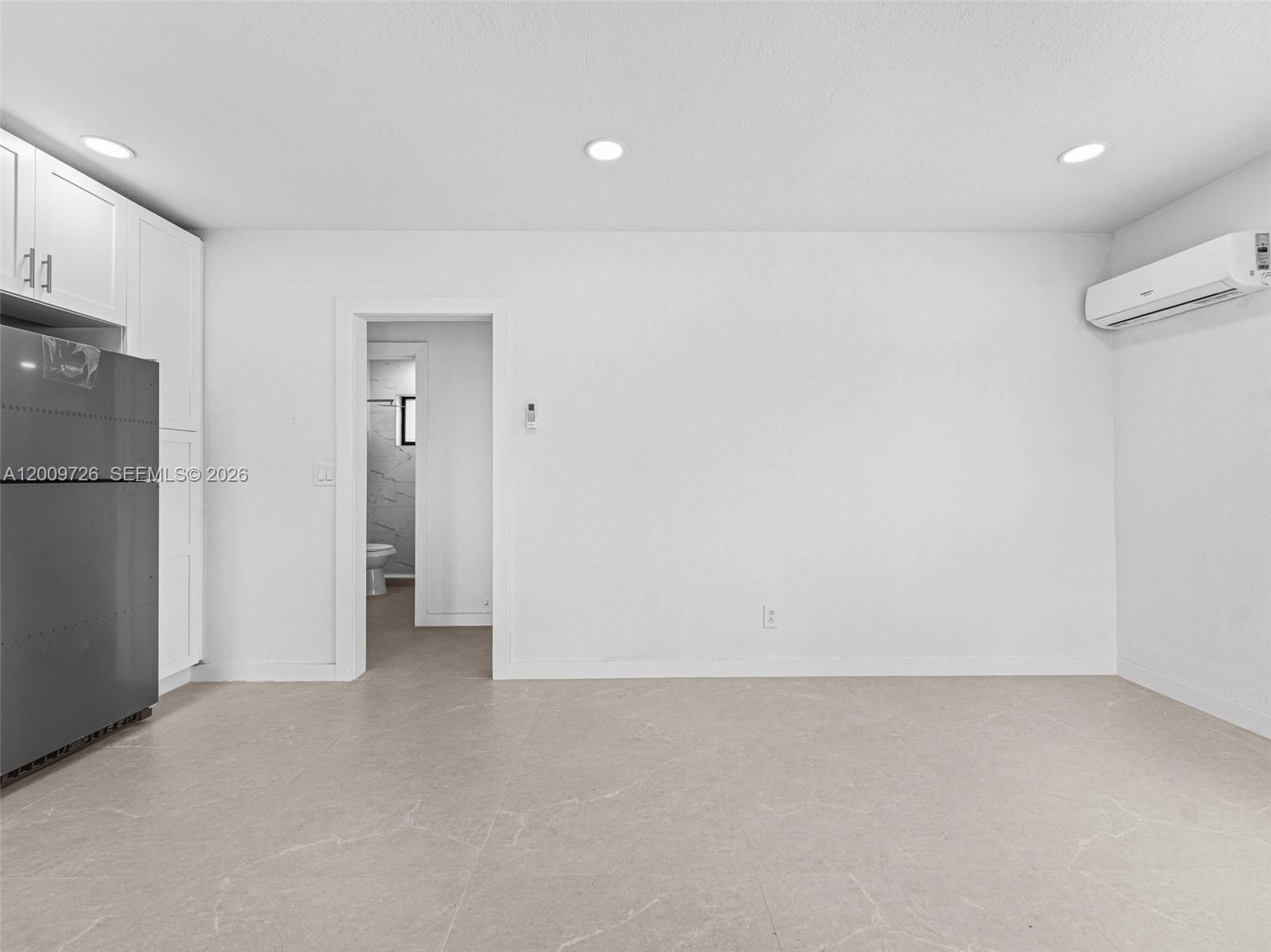 1370 West 29th Street, Unit A Hialeah, FL 33012 - Photo 15 of 16 a view of an empty room