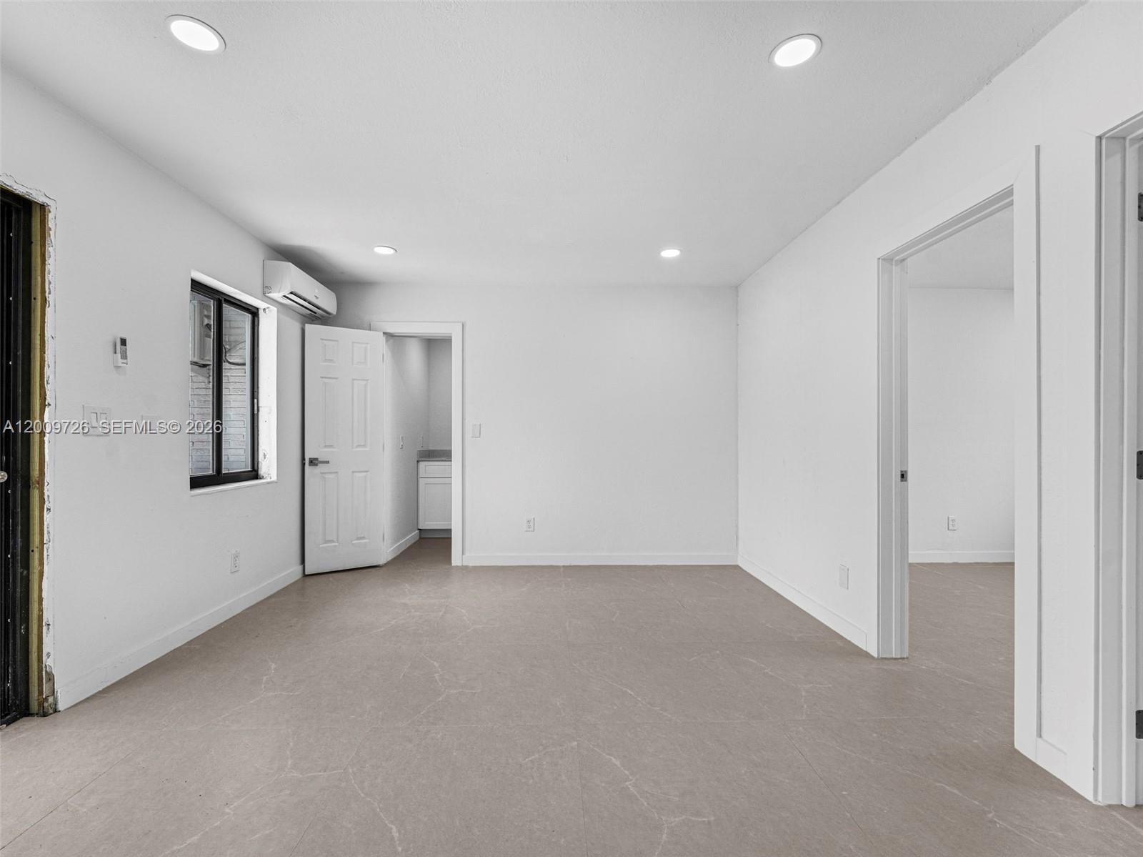 1370 West 29th Street, Unit A Hialeah, FL 33012 - Photo 9 of 16 a view of an empty room