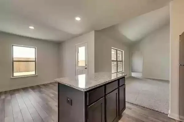 a room with window and wooden floor