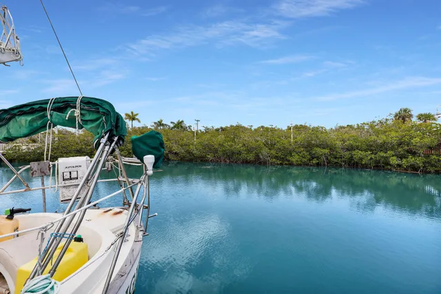 a front view of a house with a garden and porch