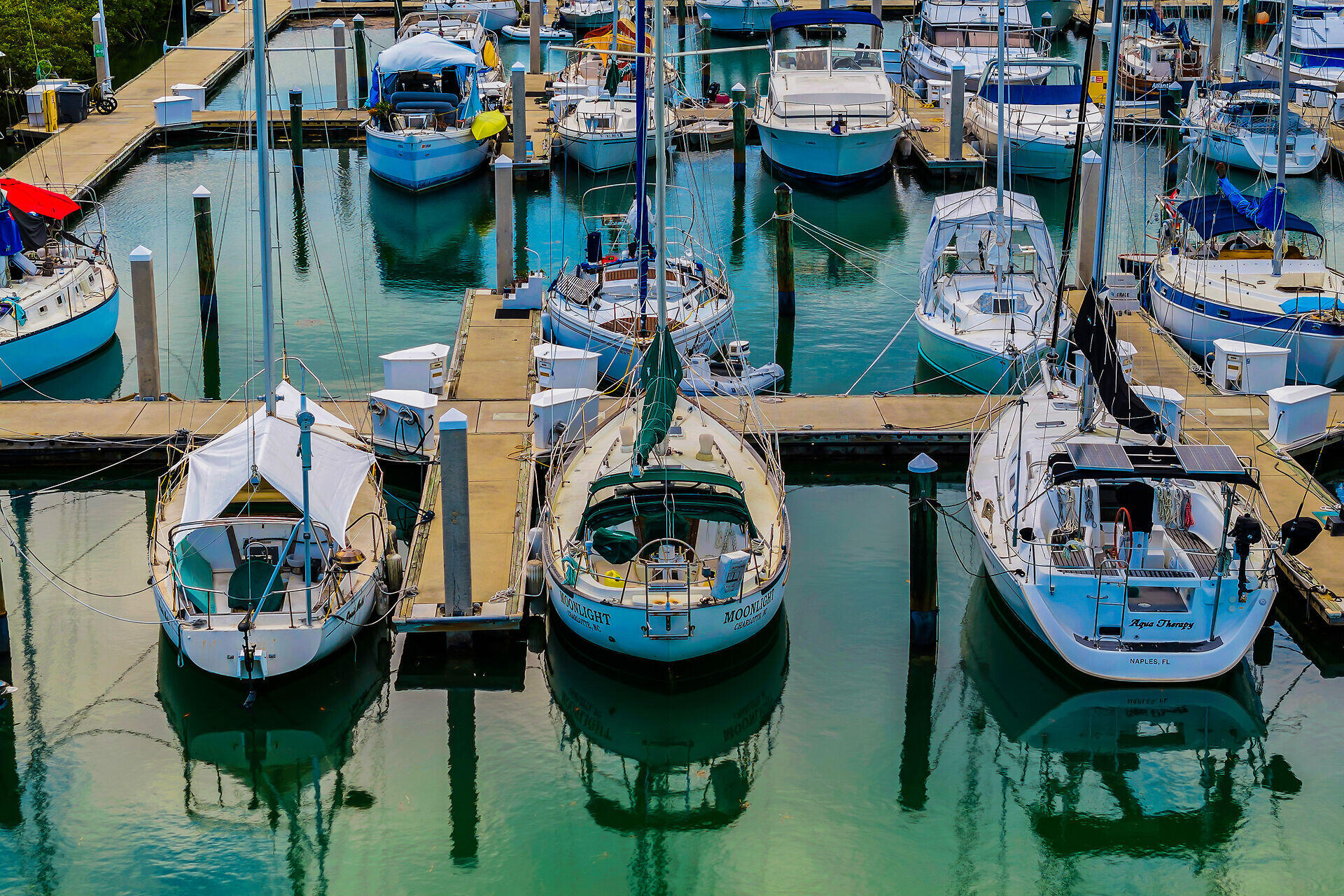 5555 College Road, Unit STARFISH 6 Key West, FL 33040 - Photo 8 of 21 a view of a chairs and tables in a play room