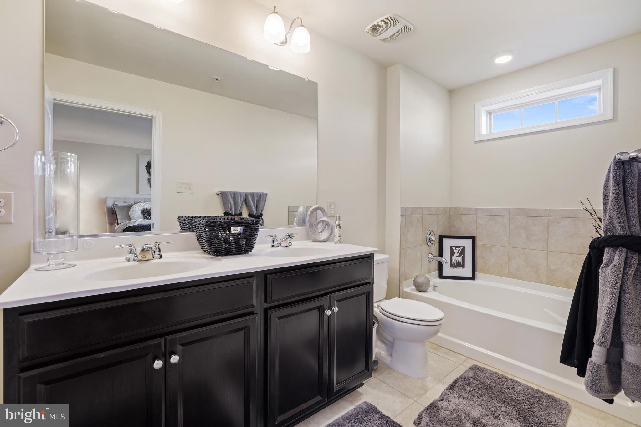7414 Four Gardens Road Brandywine, MD 20613 - Photo 18 of 30 Owner's Bath w/Double Vanity Sinks