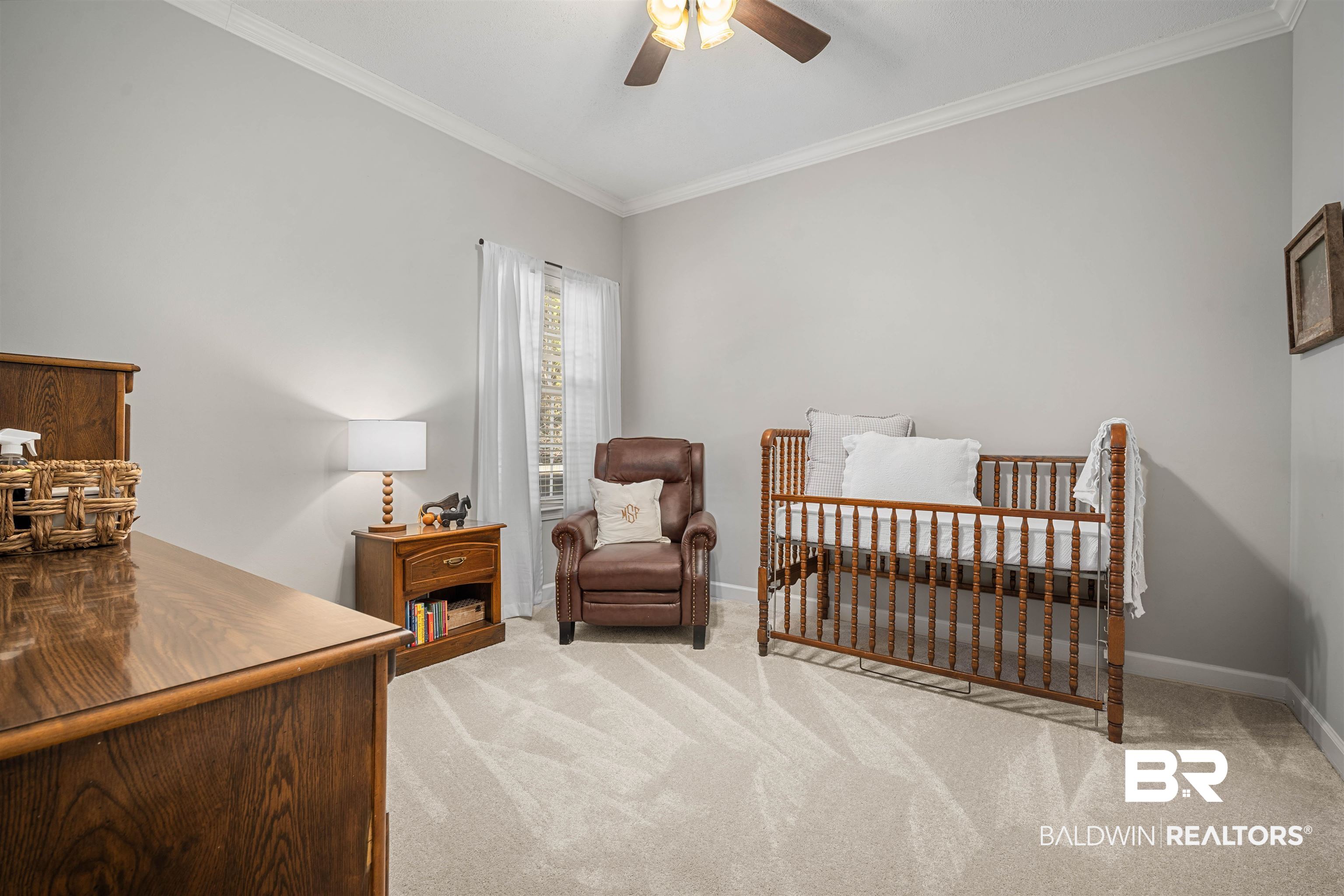27288 Parker Lane Daphne, AL 36526 - Photo 20 of 29 Bedroom with light colored carpet, crown molding, and a ceiling fan