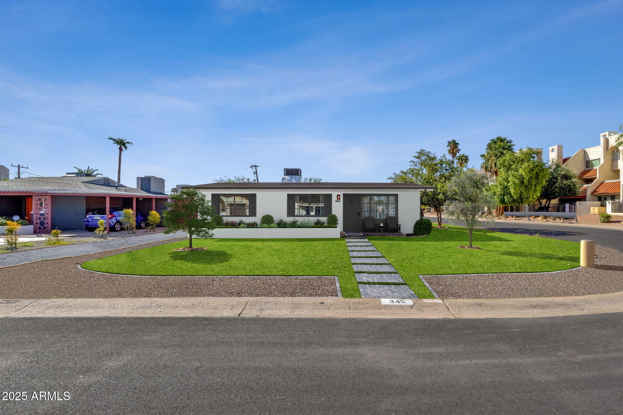 343 West Montecito Avenue Phoenix, AZ 85013 - Photo 2 of 39 a front view of a house with a garden and plants
