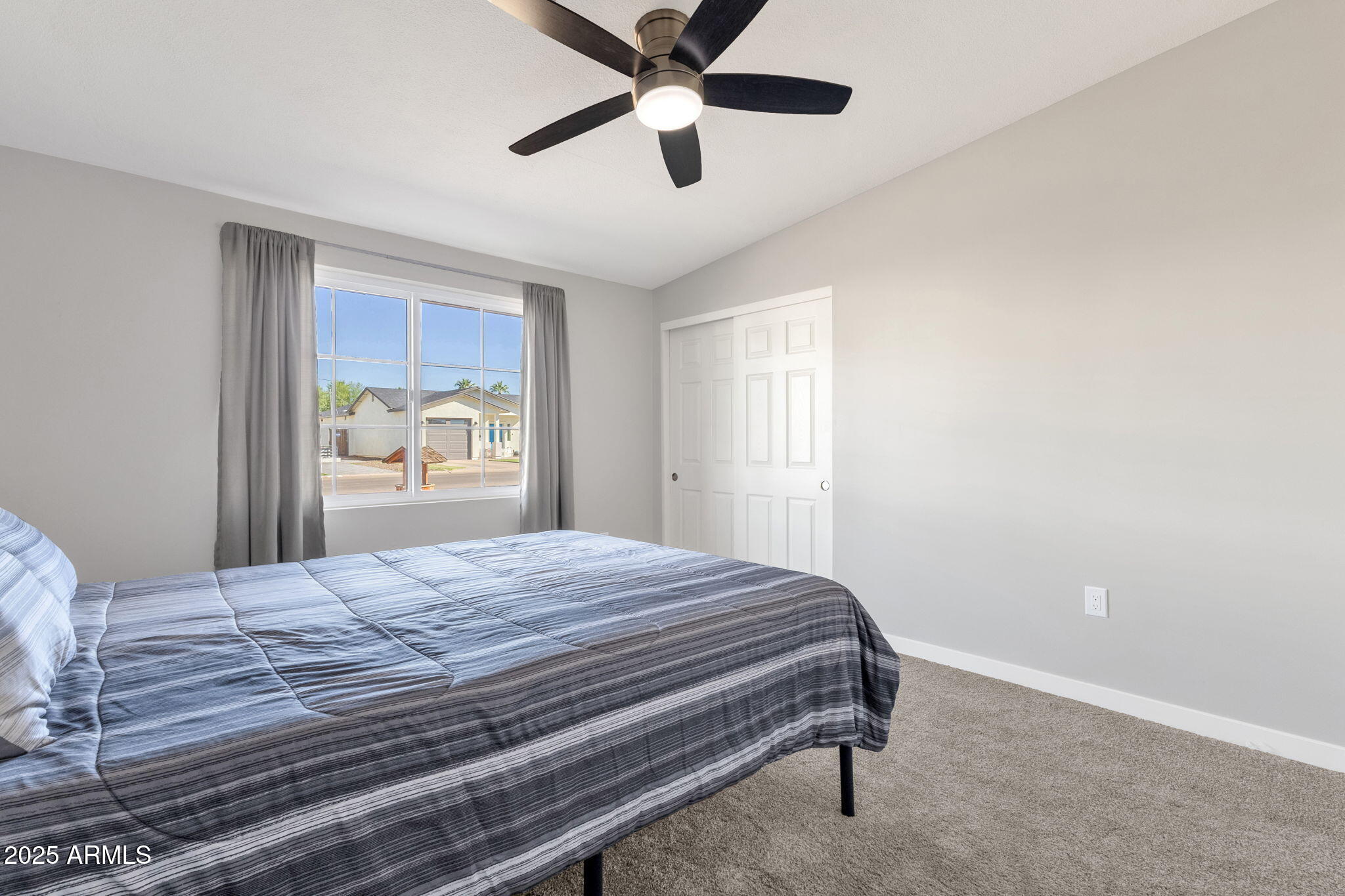 343 West Montecito Avenue Phoenix, AZ 85013 - Photo 22 of 39 a bedroom with a bed and a window
