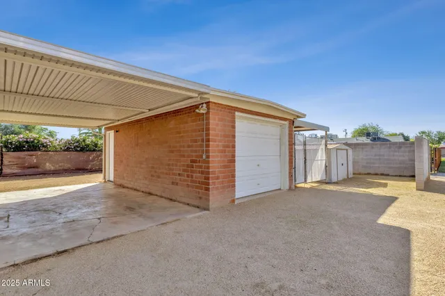 a view of a house with a snow in the yard
