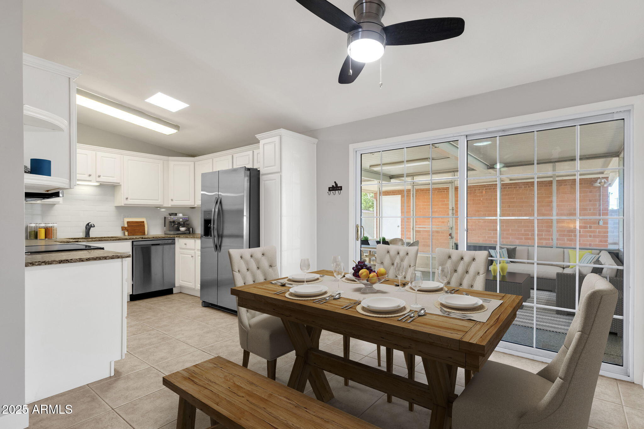 343 West Montecito Avenue Phoenix, AZ 85013 - Photo 3 of 39 a kitchen with a table chairs refrigerator and cabinets