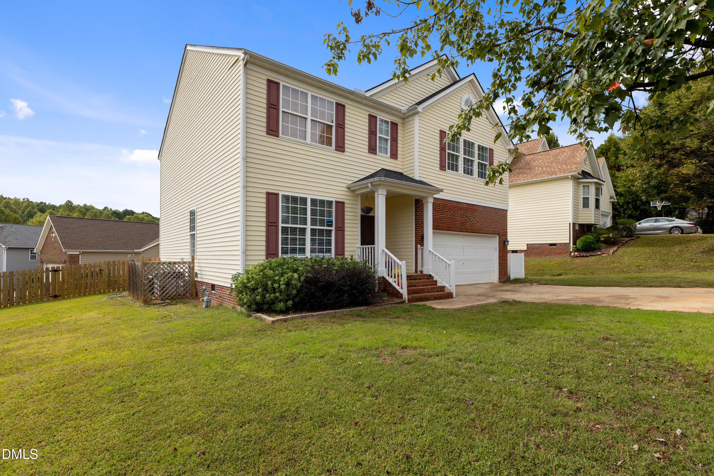101 Lyle Road Raleigh, NC 27603 - Photo 23 of 40 a front view of a house with a yard