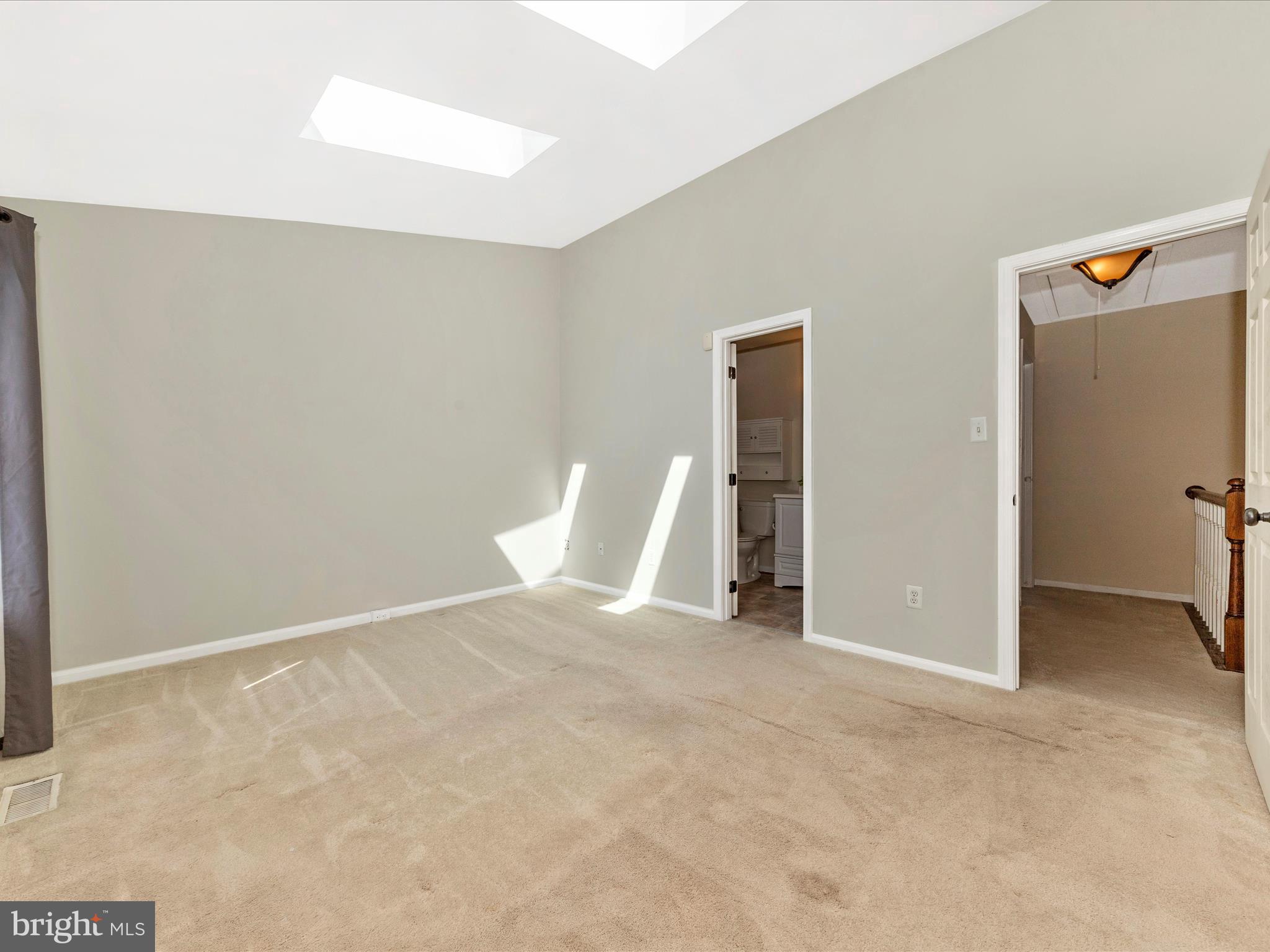 231 Coventry Square, Unit 231 Sterling, VA 20164 - Photo 20 of 40 a view of an empty room with windows
