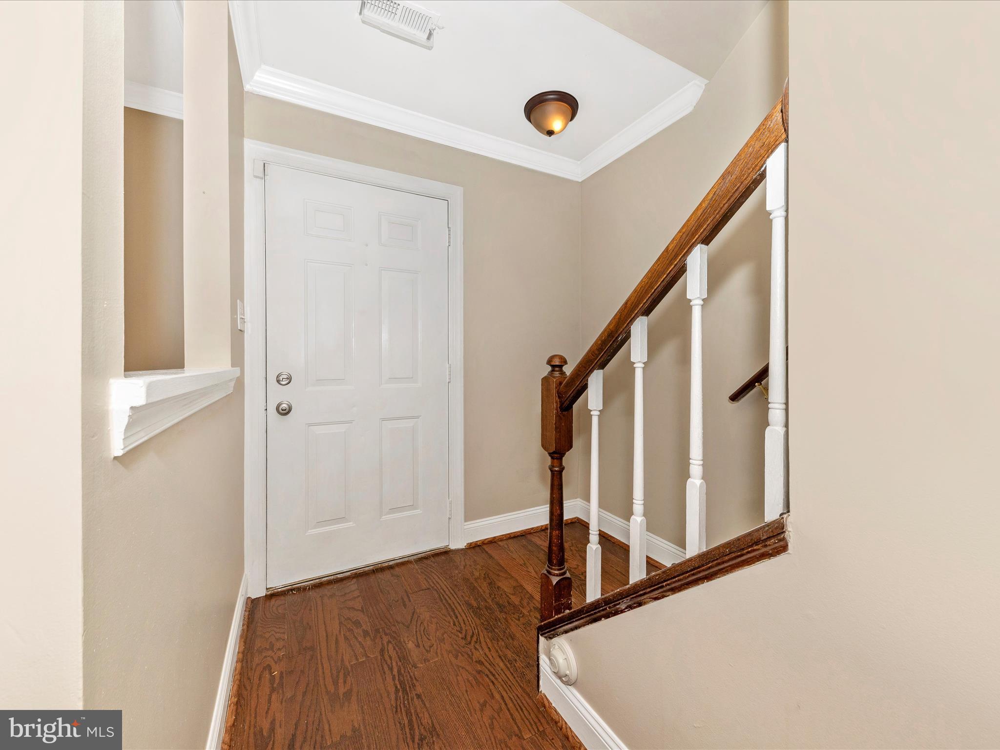 231 Coventry Square, Unit 231 Sterling, VA 20164 - Photo 2 of 40 a view of a hallway with staircase