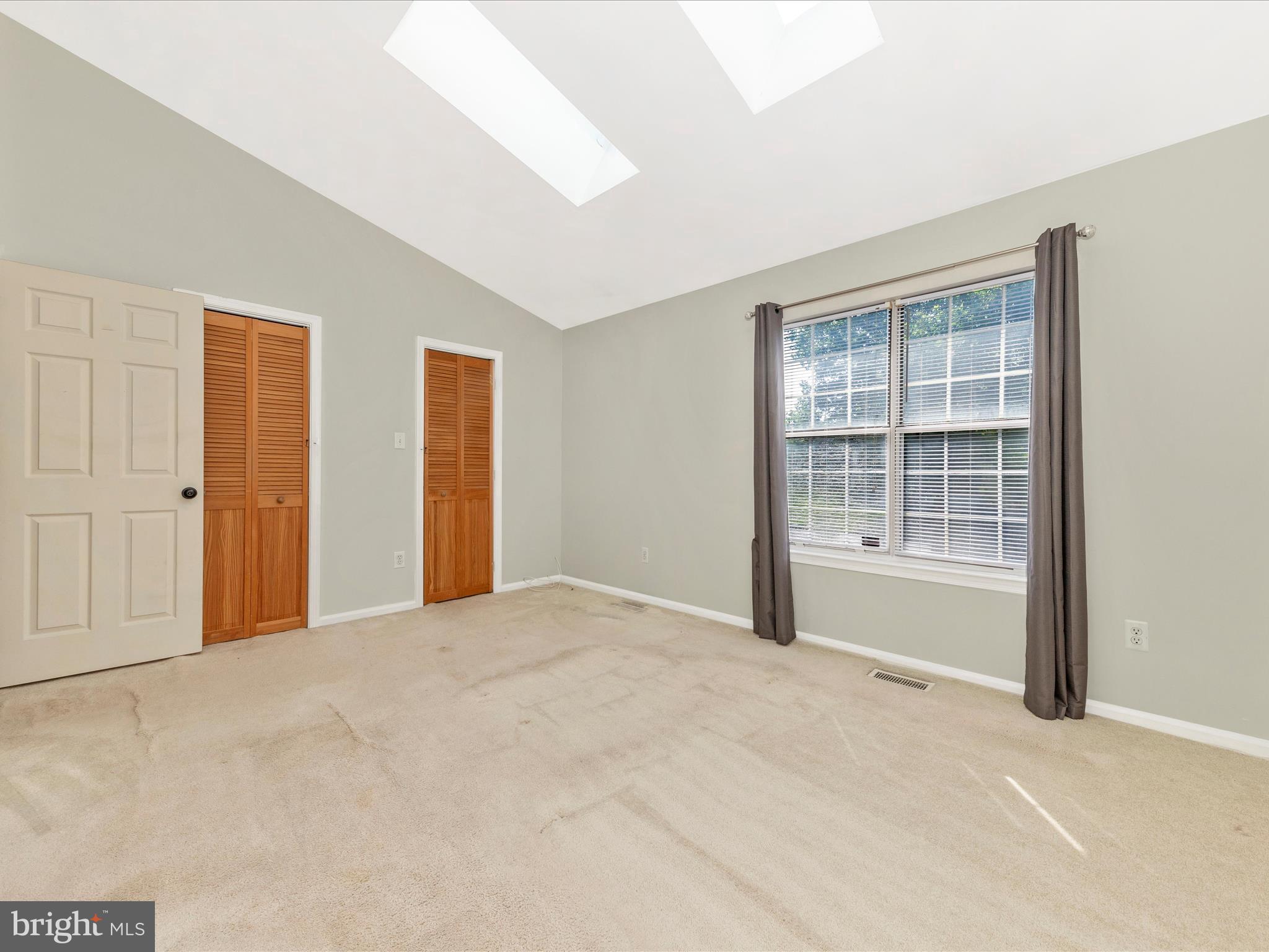231 Coventry Square, Unit 231 Sterling, VA 20164 - Photo 22 of 40 a view of an empty room with a window