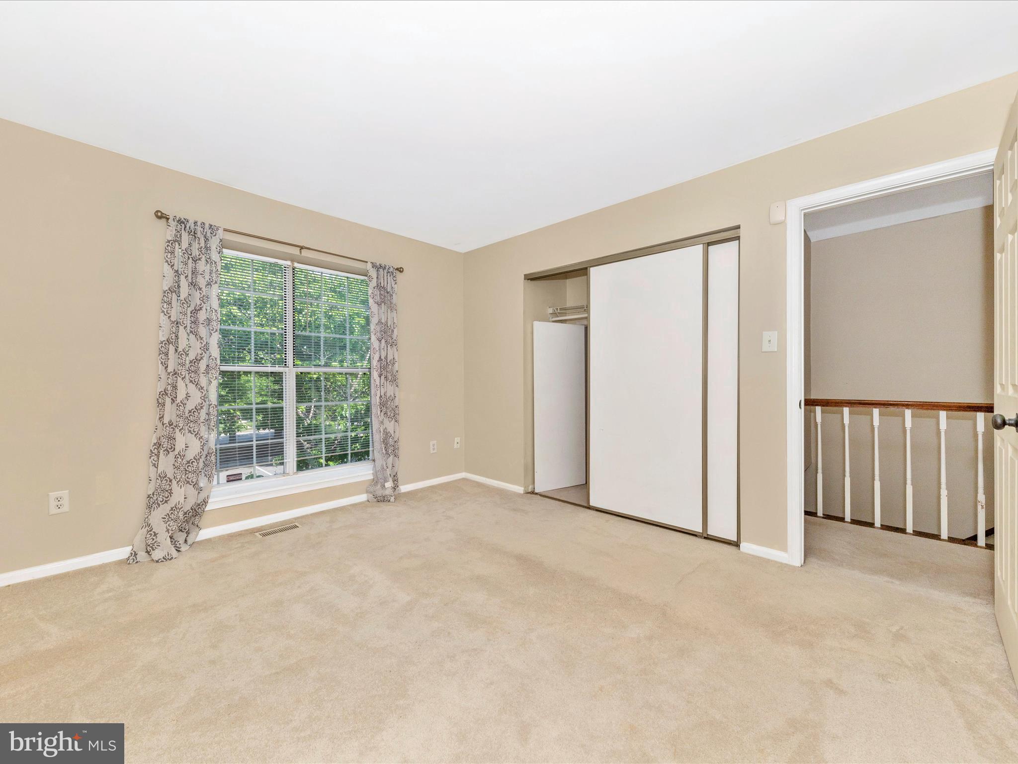 231 Coventry Square, Unit 231 Sterling, VA 20164 - Photo 25 of 40 an empty room with windows