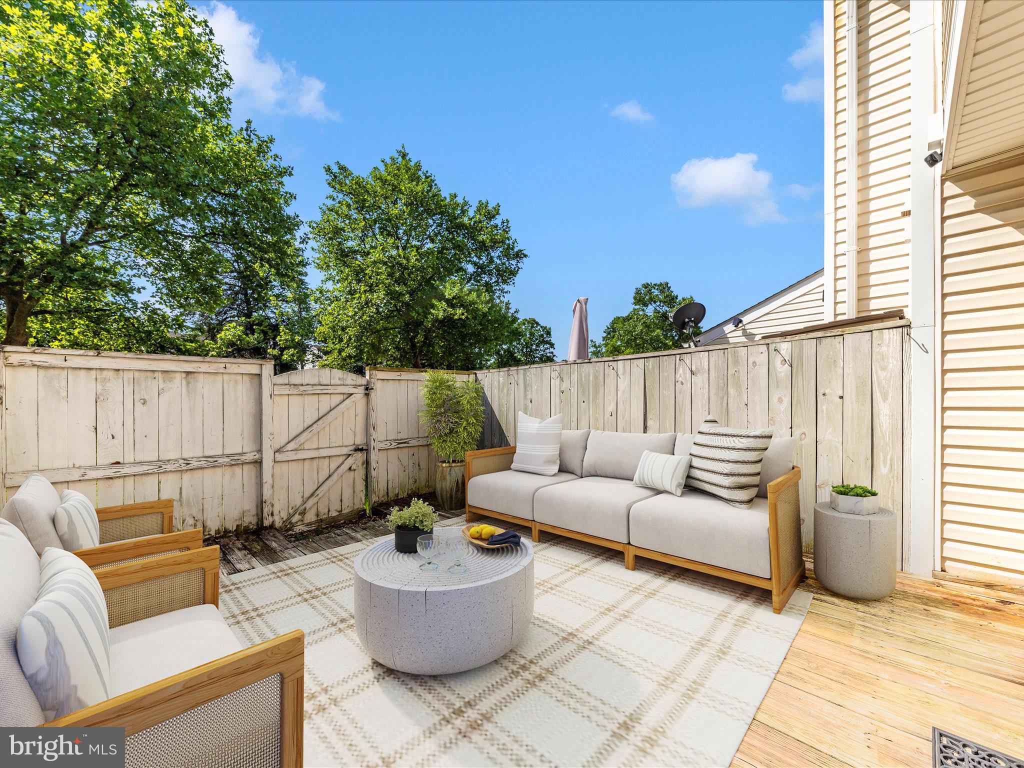 231 Coventry Square, Unit 231 Sterling, VA 20164 - Photo 36 of 40 a outdoor living space with furniture and a potted plant