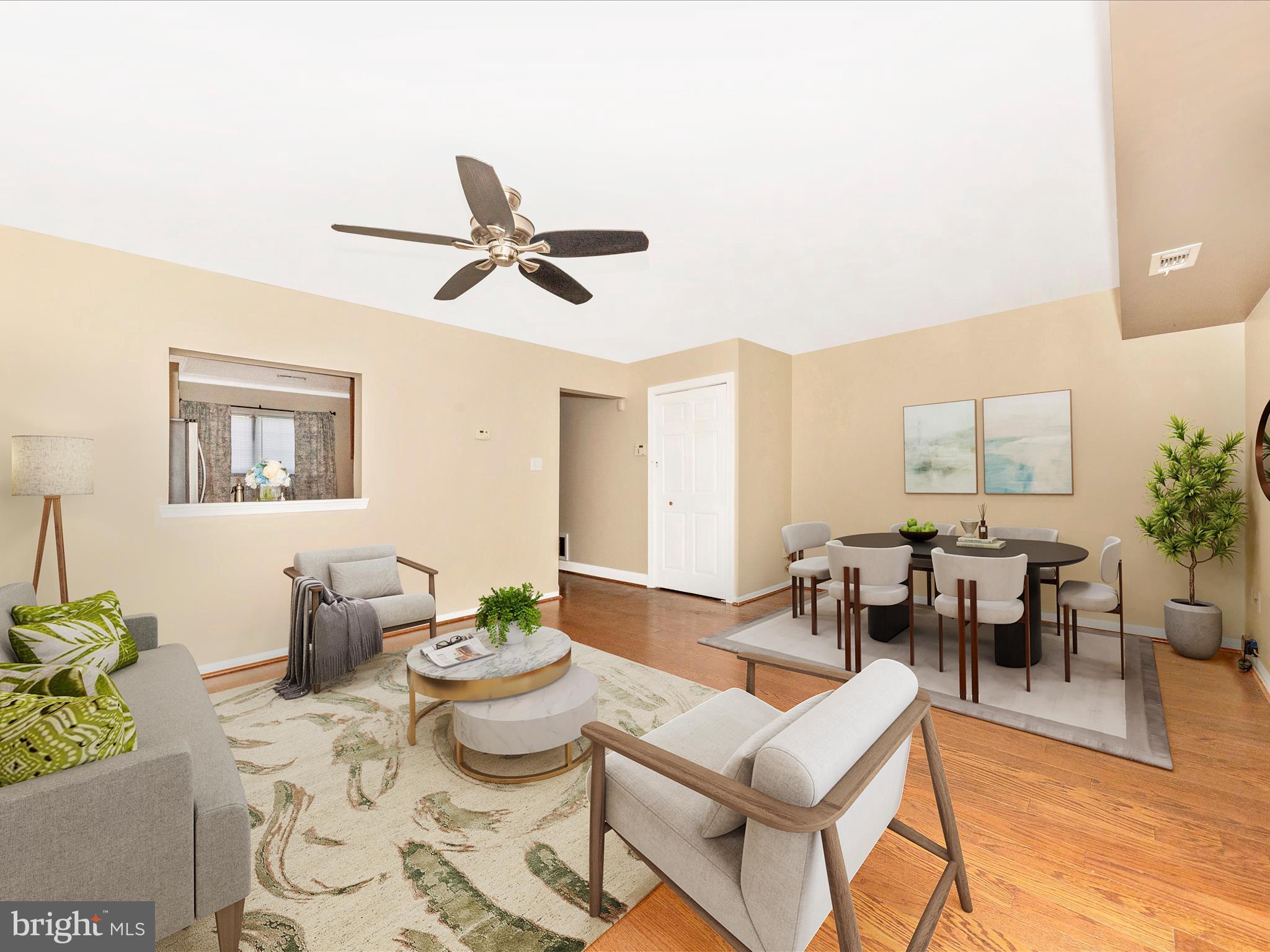 231 Coventry Square, Unit 231 Sterling, VA 20164 - Photo 9 of 40 a living room with furniture a window and a table